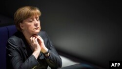 Kanselir Jerman dalam sebuah sidang parlemen di Berlin (13/3).