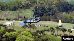 A Terminal High Altitude Area Defense (THAAD) interceptor (right) is seen in Seongju, South Korea, April 26, 2017. 