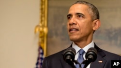 FILE - President Barack Obama speaks from the Cabinet Room of the White House in Washington, Dec. 12, 2015.