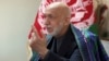 FILE - Former Afghan President Hamid Karzai speaks in Kabul, Afghanistan, April 17, 2017. 
