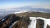 FILE - The peak of Mt. Kilimanjaro is seen from an aircraft in northeastern Tanzania, Oct. 31, 2005.