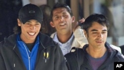 In this photograph taken on September 1, 2010, Pakistan cricketers Mohammad Amir, (L) Mohammad Asif (Back C) and captain Salman Butt (R) leave the team hotel in Taunton, in south-west England