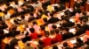 Delegates fill in their ballots during an election at the plenary session of China's parliament, National People's Congress, at the Great Hall of the People in Beijing on March 15, 2008. 
