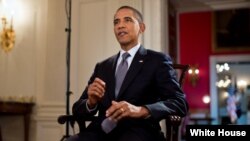President Barack Obama merekam pidato mingguannya di Gedung Putih, Jumat (17/8).