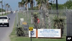 A U.S. Border Patrol truck enters the Port Isabel Detention Center, which holds detainees of U.S. Immigration and Customs Enforcement, June 26, 2018, in Los Fresnos, Texas.