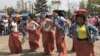Cambodian migrant workers participate in a traditional game celebrating Khmer New Year at Manseok Park in Suwon, South Korea, Sunday April 16th, 2017. (Sok Khemara/VOA Khmer) 