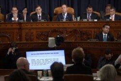 A transcript of a phone call between U.S. President Donald Trump and Ukrainian President Volodymyr Zelenskiy is shown during former U.S. Ambassador to Ukraine Marie Yovanovitch's testimony on Capitol Hill, Nov. 15, 2019.