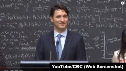 Canadian Prime Minister Justin Trudeau speaks with reporters about quantum computing during an event at a physics research lab in Ontario in April 2016.