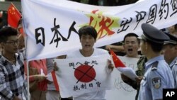 Protes anti-Jepang di Beijing, yang mendesak Jepang keluar dari kepulauan Diayou. (Foto: AP)