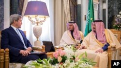 In this handout image provided by the state owned Saudi Press Agency, U.S. Secretary of State John Kerry, left, meets with Saudi King Salman right, in what likely will be his last visit as America’s top diplomat, Dec. 18, 2016