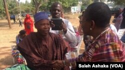 Mr. Solomon Yusuf wanda Boko Haram ta sace dansa yayi gangami da BBOG Kungiyar dake fafutikan ganin an sako sauran 'yan matan Chibok tayi maci a Abuja