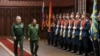 Russian Defense Minister Sergei Shoigu (L) and Commander-in-Chief of Myanmar's armed forces, Senior General Min Aung Hlaing walk past the honor guard prior to their talks in Moscow, June 22, 2021. (Vadim Savitskiy/Russian Defense Ministry Press Service)