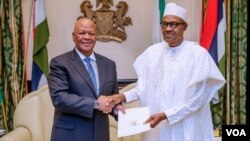 Shugaban kasan Najeriya Muhammadu Buhari da Mista Jett Radebe