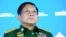 FILE - Commander-in-Chief of Myanmar's armed forces, Senior General Min Aung Hlaing delivers his speech at the IX Moscow conference on international security in Moscow, Russia, June 23, 2021.