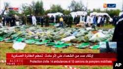 Image taken from Algerian TV network Ennahar shows body bags of victims placed near the scene after a military plane which crashed soon after takeoff from Boufarik military base, near the Algerian capital, April 11, 2018. 