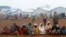 FILE - Refugees from the Democratic Republic of Congo are seen at Kyangwali camp, Uganda, March 19, 2018.