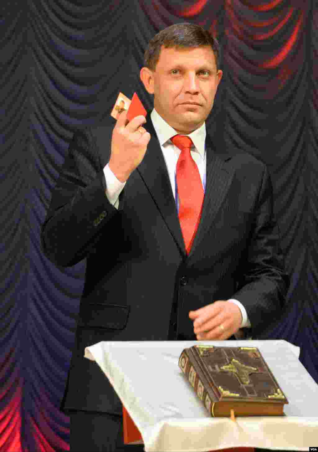Pro-Russian rebel leader Alexander Zakharchenko stands during his swearing-in ceremony, Donetsk, Nov. 4, 2014. 