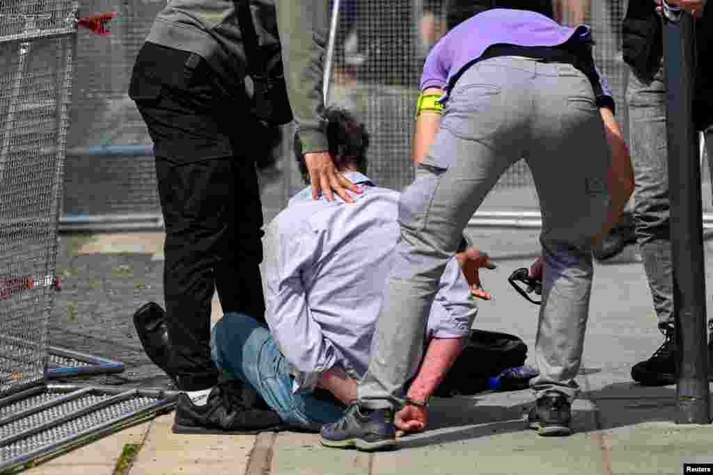 A person is detained after shooting incident of Slovak PM Robert Fico, after a Slovak government meeting in Handlova, Slovakia, May 15, 2024.