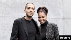Janet Jackson dan suaminya Wissam Al Mana di Pekan Mode Milan, 2013. (Reuters/Alessandro Garofalo)