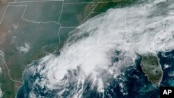 This GOES-16 GeoColor satellite image taken on Sept. 19, 2020, and provided by NOAA, shows Tropical Storm Beta, in the Gulf of Mexico.