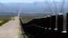 FILE - A U.S. Customs and Border Patrol truck patrols the U.S. border with Mexico in Douglas, Ariz., March 18, 2016.