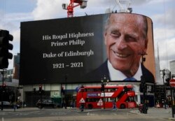 A tribute to Britain's Prince Philip is projected onto a large screen at Piccadilly Circus in London, April 9, 2021.