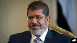 Presiden Mesir Mohammed Morsi berjanji akan membatasi kekuasaan absolut Presiden dalam pertemuan dengan Dewan Kehakiman Agung Mesir (foto: dok). 