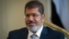 Egypt's Morsi Defends New Powers Amid Protests