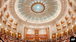 FILE - The interior of Romania's parliament building is seen in Bucharest, Romania, Oct. 10, 2011. 