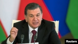 FILE - Uzbek President Shavkat Mirziyoyev speaks during a news conference in Moscow's Kremlin, Russia, April 5, 2017. 