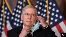 Senate Majority Leader Mitch McConnell of Ky., listens to a question during a news conference on Capitol Hill in Washington, Monday, July 27, 2020, to highlight the new Republican coronavirus aid package. (AP Photo/Susan Walsh)