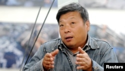 中国摄影师卢广