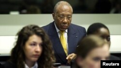 Former Liberian President Charles Taylor listens to the judge at the opening of the sentencing judgement hearing at the court in Leidschendam, near The Hague, May 30, 2012. 