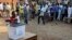 FILE - A man casts his vote at a polling station during presidential elections in Accra, Ghana, Dec. 7, 2012. 