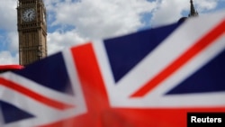 FILE - A union flag is seen near the Houses of Parliament in London, Britain, April 18, 2017.