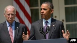 Predsednik Obama, uz potpredsednika Bajdena, u Beloj kući saopštava planove o ponovnom otvaranju američke ambasade u Havani, 1. jula 2015. 