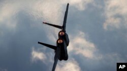 FILE - An Israeli Air Force F-15 in flight near the city of Beersheba.