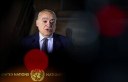 FILE - U.N. Envoy for Libya Ghassan Salame holds a news briefing ahead of U.N.-brokered military talks in Geneva, Switzerland, Feb. 4, 2020.