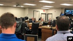 South Carolina Republican Sen. Richard Cash reads from a statement supporting removing restrictions for rape and incest victims from a strict "heartbeat" abortion ban in Columbia, South Carolina, Nov. 5, 2019.