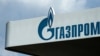 FILE - The logo of Russia's energy giant Gazprom is pictured at one of its gasoline stations in Moscow, April 16, 2021.