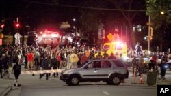 Protesters block traffic at an intersection an intersection near Capitol Square in Madison, Wis., June 23, 2020. 