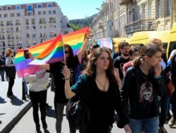 Georgian LGBT activists attend a rally against homophobia outside the State Chancellery to mark international day against homophobia.