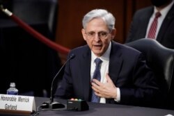 Judge Merrick Garland, President Joe Biden's pick to be attorney general, answers questions from Sen. John Kennedy, R-La., as he appears before the Senate Judiciary Committee for his confirmation hearing, on Capitol Hill in Washington, Feb. 22, 2021.