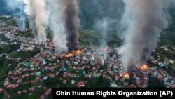 MyanmarFires burn in the town of Thantlang in Myanmar's northwestern state of Chin, Oct. 29, 2021. More than 160 buildings in the town in the northwestern Myanmar, including three churches, have been destroyed by fire caused by shelling by government troo