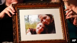 Law enforcement officers restrain a demonstrator during a rally of entrepreneurs and representatives of small businesses amid the COVID-19 outbreak in Kyiv, Ukraine.