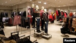 FILE - General view of a store that sells international brands at Venice Street in Benghazi, Libya, Feb. 6, 2019. 