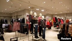 FILE - General view of a store that sells international brands at Venice Street in Benghazi, Libya, Feb. 6, 2019. 