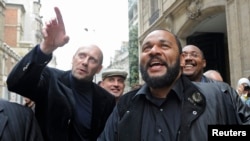 FILE - French comedian Dieudonne M'bala M'bala at the French Interior Ministry in Paris, May 13, 2009. 