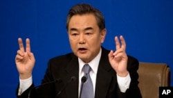 China's Foreign Minister Wang Yi speaks at a press conference in Beijing, March 8, 2015.