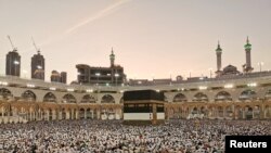 Muslims pray at the Grand Mosque during the annual Hajj pilgrimage in their holy city of Mecca, Saudi Arabia, Aug. 8, 2019.